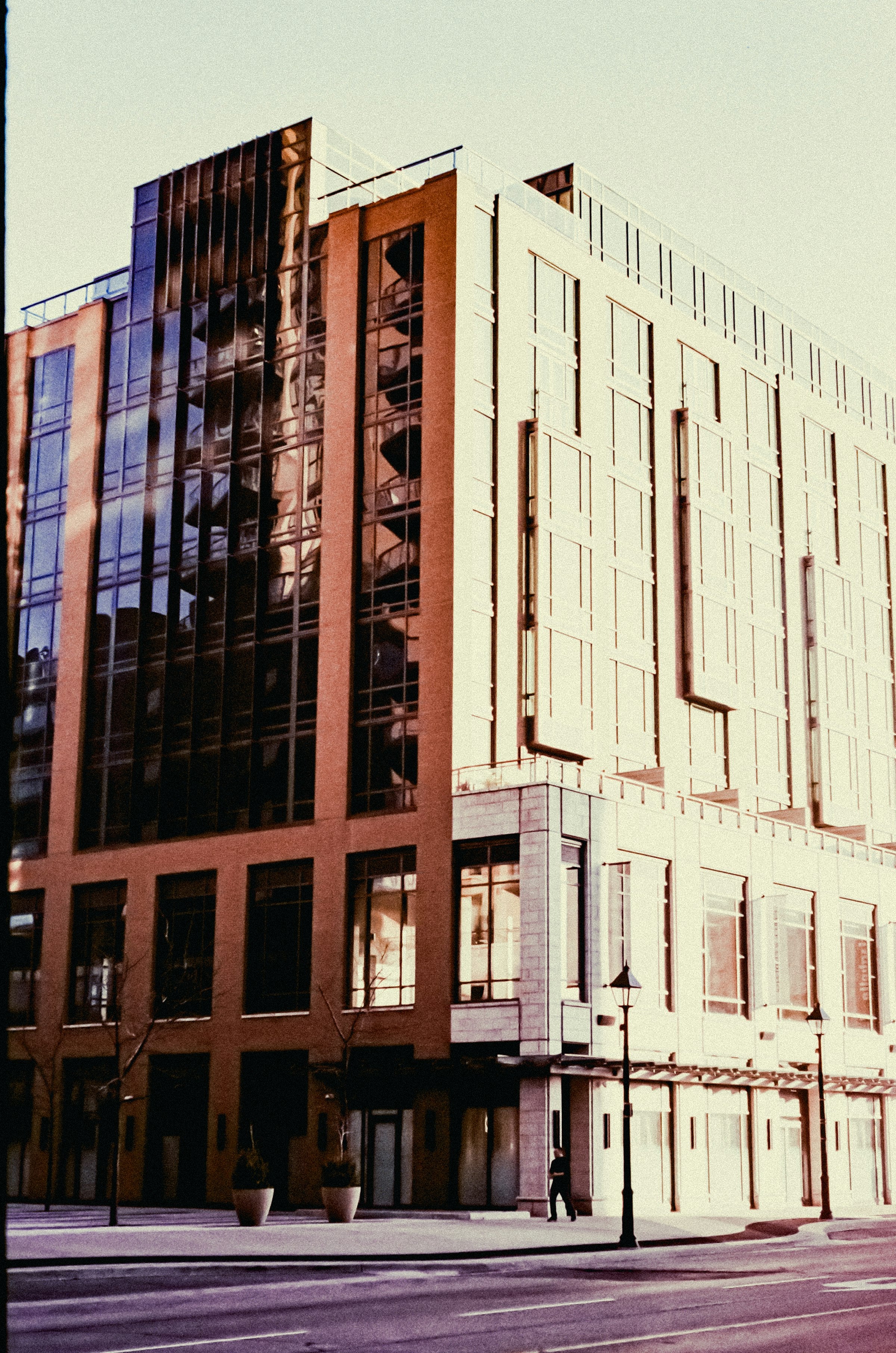 Modern office building exterior with glass and brick facade